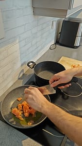 Add salmon to frying pan